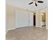 Spacious bedroom with closet and access to the bathroom at 616 E Lavitt Ln, Phoenix, AZ 85086