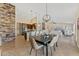 Open-concept layout seamlessly connects kitchen, dining area, and living room for entertaining at 616 E Lavitt Ln, Phoenix, AZ 85086