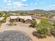 Charming single-story home with desert landscaping and stone accents creating a welcoming curb appeal at 616 E Lavitt Ln, Phoenix, AZ 85086