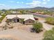 Charming single-story home with desert landscaping and stone accents, creating a welcoming curb appeal at 616 E Lavitt Ln, Phoenix, AZ 85086