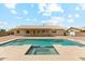 Backyard swimming pool with surrounding patio space at 616 E Lavitt Ln, Phoenix, AZ 85086