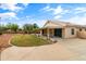 Lovely home featuring a covered patio and low-maintenance desert landscaping at 662 S Saddle St, Gilbert, AZ 85233
