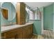 Main bathroom with dual sinks and walk-in shower at 662 S Saddle St, Gilbert, AZ 85233