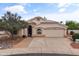 Charming single-story home with a well-maintained lawn, desert landscaping, and inviting curb appeal at 662 S Saddle St, Gilbert, AZ 85233