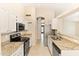 Kitchen boasting granite countertops and stainless steel appliances at 662 S Saddle St, Gilbert, AZ 85233