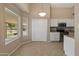 Eat in kitchen area with sliding closet and large window at 662 S Saddle St, Gilbert, AZ 85233