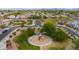 Aerial view of neighborhood park shows playground and green space at 6907 S 8Th Dr, Phoenix, AZ 85041