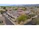 Home sits within a well-maintained neighborhood, showcasing lush landscaping at 6907 S 8Th Dr, Phoenix, AZ 85041