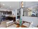 Open dining area adjacent to the kitchen, perfect for Gathering meals and entertaining at 6907 S 8Th Dr, Phoenix, AZ 85041