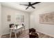 Cozy bedroom features wood-look floors, window, and a decorative map at 701 W Mesquite St, Chandler, AZ 85225