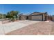 Inviting single-story home with a two-car garage and low-maintenance desert landscaping at 701 W Mesquite St, Chandler, AZ 85225