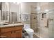 Well-appointed bathroom featuring a glass-enclosed shower and a granite-topped vanity with ample storage space at 7144 E San Cristobal Way, Gold Canyon, AZ 85118
