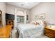 Serene bedroom with a comfortable bed, soft natural light, and tasteful decor, creating a relaxing retreat at 7144 E San Cristobal Way, Gold Canyon, AZ 85118