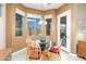 Bright breakfast nook with large windows providing natural light and scenic views at 7144 E San Cristobal Way, Gold Canyon, AZ 85118