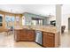 Kitchen area with breakfast nook, granite countertops, stainless appliances and ample counter space at 7144 E San Cristobal Way, Gold Canyon, AZ 85118