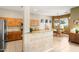 Open concept kitchen with granite counters, stainless steel appliances, and light-colored cabinetry at 7144 E San Cristobal Way, Gold Canyon, AZ 85118