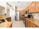 Spacious kitchen with stainless steel appliances, ample counter space, and an open layout at 7144 E San Cristobal Way, Gold Canyon, AZ 85118