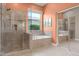 Beautiful bathroom featuring a glass shower, separate soaking tub, and stylish tile work, creating a spa-like retreat at 7144 E San Cristobal Way, Gold Canyon, AZ 85118