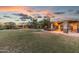 Well-maintained community picnic area with manicured lawns and colorful sunset at 7144 E San Cristobal Way, Gold Canyon, AZ 85118