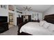 Large primary bedroom featuring a bay window with white shutters, a ceiling fan, and an alcove at 7272 W Crystal Rd, Glendale, AZ 85308