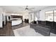 Open floorplan view of the kitchen, dining area and living room with backyard access at 7272 W Crystal Rd, Glendale, AZ 85308
