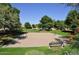An inviting sand volleyball court awaits in a lush park setting, perfect for outdoor fun and recreation at 7272 W Crystal Rd, Glendale, AZ 85308
