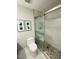Stylish bathroom featuring a glass-enclosed shower, modern fixtures, and tiled floor at 7409 N Via Camello Del Norte -- # 138, Scottsdale, AZ 85258