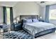 Serene bedroom featuring a plush bed, soft lighting, side tables, and peaceful decor at 7409 N Via Camello Del Norte -- # 138, Scottsdale, AZ 85258