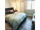 This bedroom has a large bed, closet, and lots of light coming in from the windows at 7409 N Via Camello Del Norte -- # 138, Scottsdale, AZ 85258