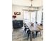 Charming dining area adjacent to patio, complemented by stylish furnishings and modern accents at 7409 N Via Camello Del Norte -- # 138, Scottsdale, AZ 85258