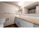 Bathroom featuring tile floors, standard toilet, and a vanity with lots of counter space at 7755 W Cora Ln, Phoenix, AZ 85033