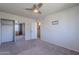 Bright bedroom with mirrored closet doors and neutral carpeting at 7830 E Valley Vista Dr, Scottsdale, AZ 85250