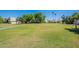 Expansive green common area surrounded by trees and walking path at 7830 E Valley Vista Dr, Scottsdale, AZ 85250