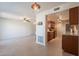 Open-concept kitchen with modern appliances, granite countertops, and direct access to the living area at 7830 E Valley Vista Dr, Scottsdale, AZ 85250