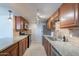 Well-appointed kitchen featuring granite countertops, stainless steel appliances, and ample cabinet space at 7830 E Valley Vista Dr, Scottsdale, AZ 85250