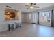 Open-concept living room featuring neutral tile floors and lots of natural light at 7830 E Valley Vista Dr, Scottsdale, AZ 85250