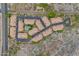 Aerial view of community featuring lush landscaping and a swimming pool at 7887 N 16Th St # 226, Phoenix, AZ 85020