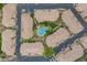 Aerial view of community featuring lush landscaping and a sparkling pool at 7887 N 16Th St # 226, Phoenix, AZ 85020