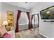 Bedroom featuring a ceiling fan, warm lighting, and a sliding door closet at 7887 N 16Th St # 226, Phoenix, AZ 85020