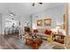 Spacious living room with a hardwood floors open to the dining and kitchen areas at 7887 N 16Th St # 226, Phoenix, AZ 85020
