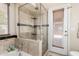 Bathroom featuring bathtub and shower combo, and a white door with blinds at 7930 W Wescott Dr, Glendale, AZ 85308