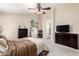 Spacious main bedroom features neutral carpet and a large window for natural light at 7930 W Wescott Dr, Glendale, AZ 85308