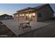 Spacious backyard featuring a covered patio and a concrete slab, great for outdoor entertaining at 8678 S John Jacob Astor Ave, Casa Grande, AZ 85193