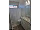 Bathroom featuring white vanity, granite counters, framed mirror, and shower/tub combo at 8678 S John Jacob Astor Ave, Casa Grande, AZ 85193