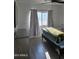 Comfortable bedroom featuring wood-look flooring and neutral paint at 8678 S John Jacob Astor Ave, Casa Grande, AZ 85193