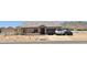 Charming single-story home with desert landscaping, multi-car parking, and mountain views at 8678 S John Jacob Astor Ave, Casa Grande, AZ 85193