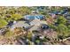 Aerial view of the attractive clubhouse with a water feature, and the American flag proudly displayed at 9265 N 115Th St, Scottsdale, AZ 85259
