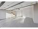A large, three car garage with epoxy floors, plenty of storage and updated garage door at 9265 N 115Th St, Scottsdale, AZ 85259