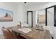 Functional home office with modern desk, comfortable seating, natural light, and stylish decor at 9265 N 115Th St, Scottsdale, AZ 85259