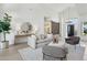 Bright living room with stylish decor and ample seating, perfect for entertaining at 9265 N 115Th St, Scottsdale, AZ 85259